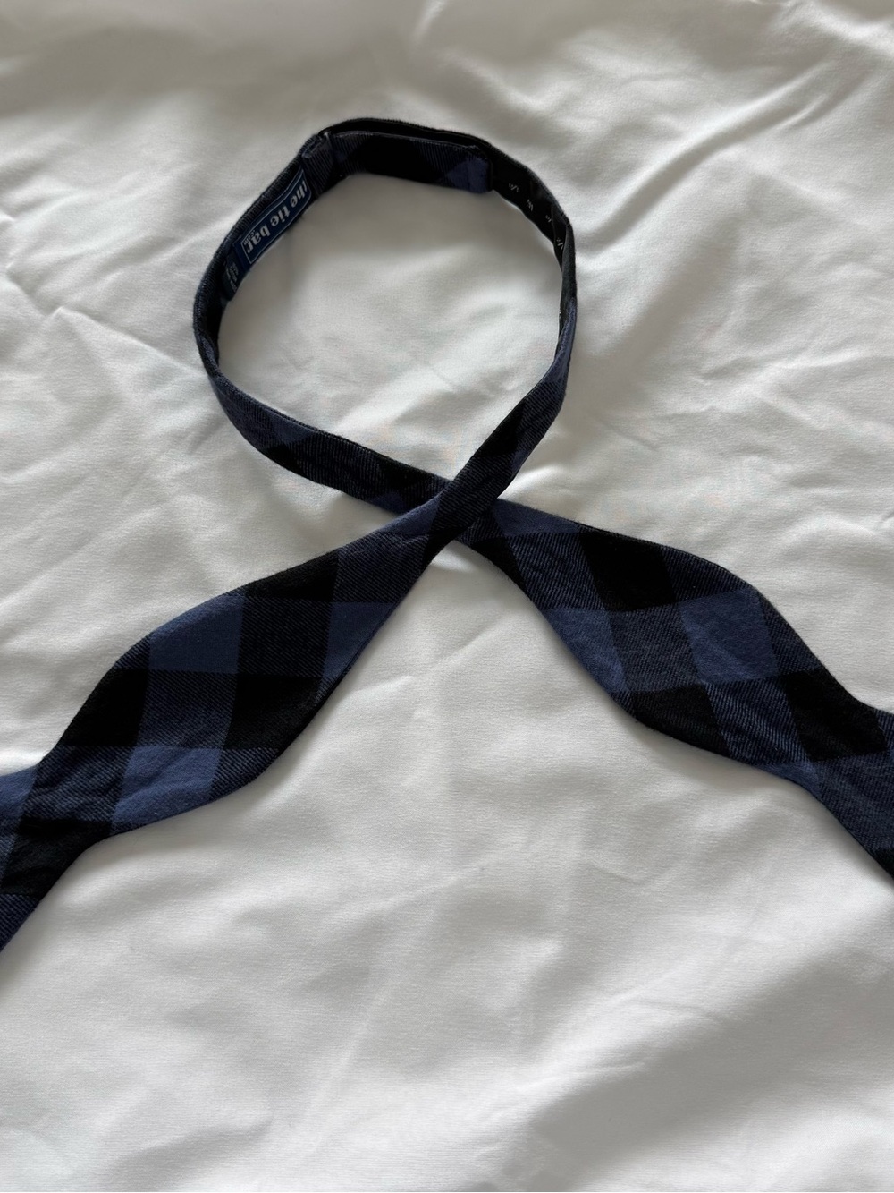 The Tie Bar Black and Navy Plaid Bow Tie